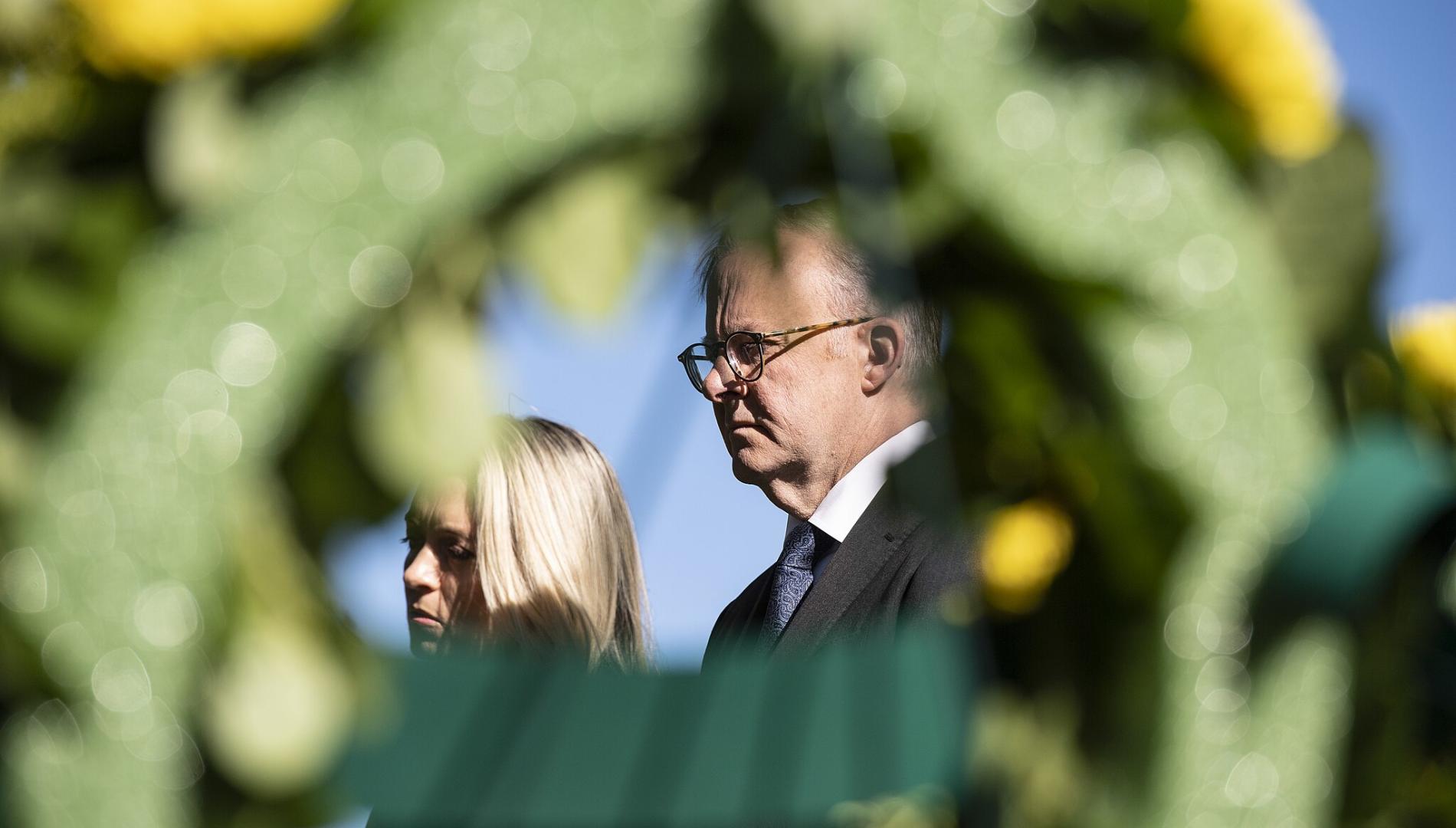 Australian Prime Minister Anthony Albanese with partner Jodie Haydon at Arlington National Cemetery in the US