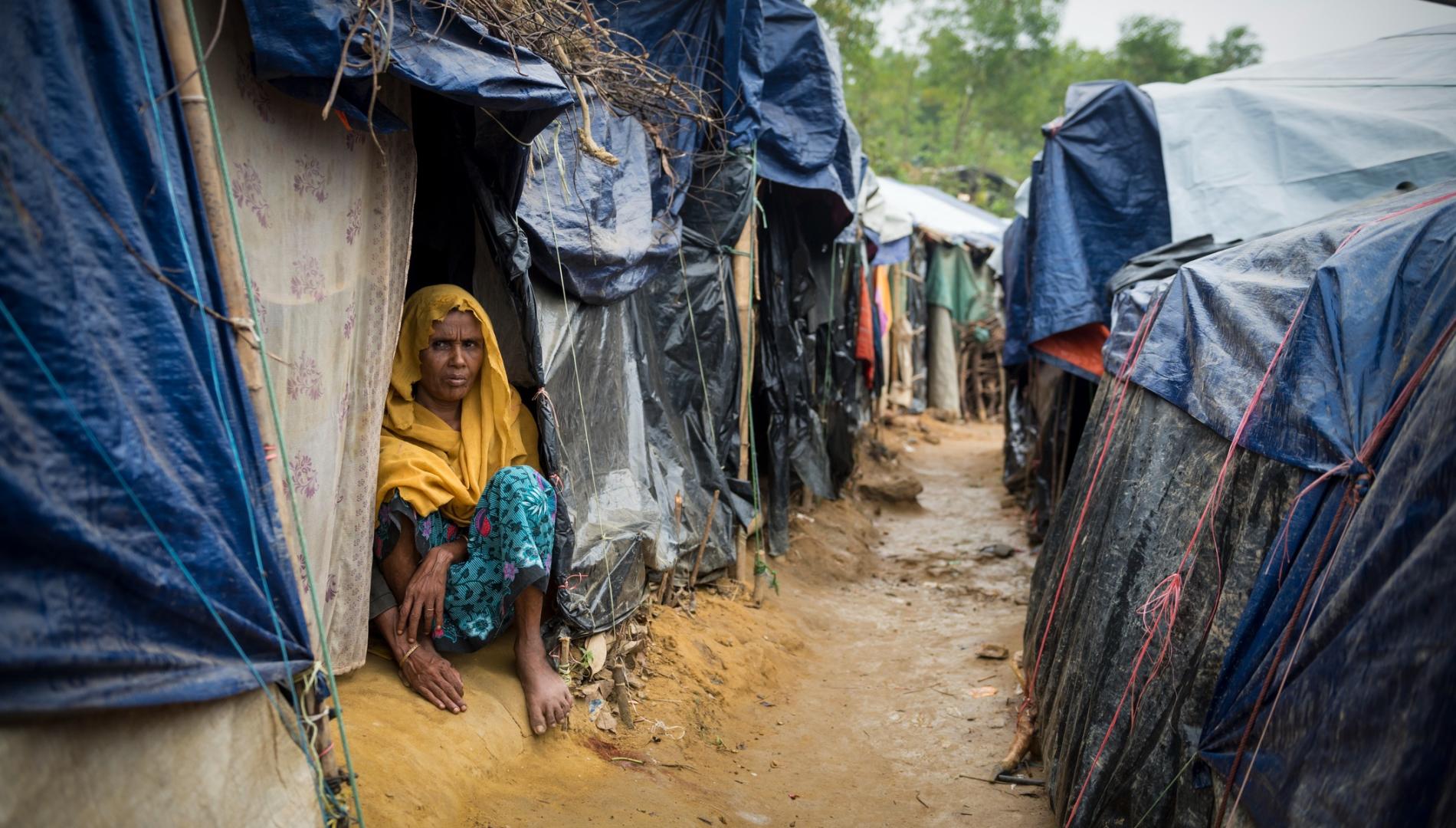 Rohingya woman and shelters at Kutupalong refugee camp in Bangladesh 