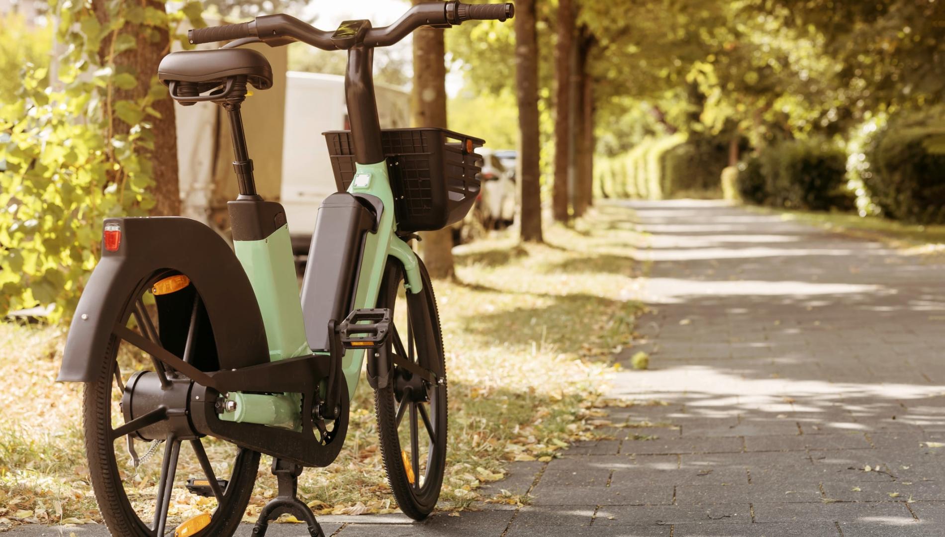 An e-bike parked on a suburban path