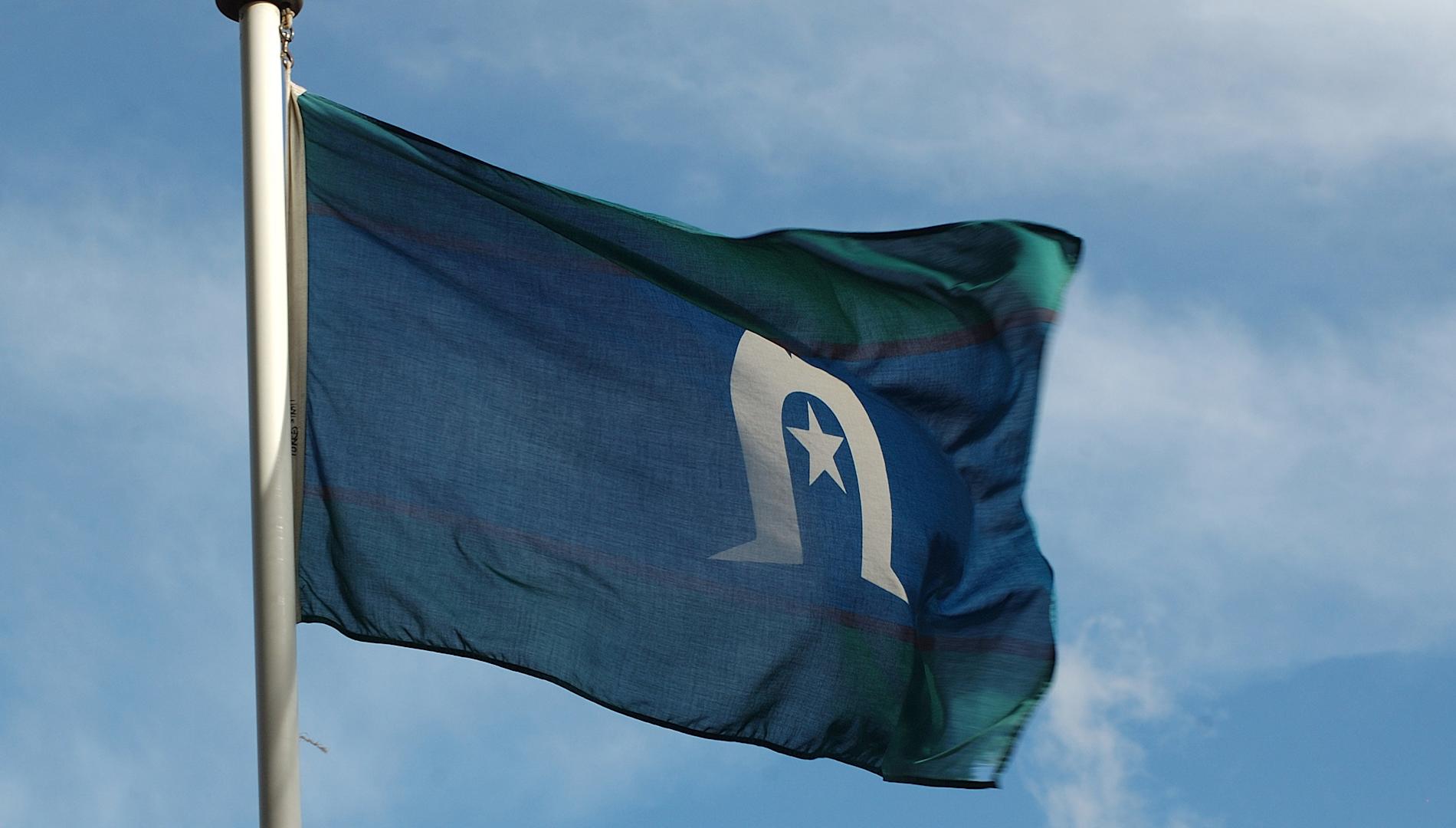 Torres Strait Islands flag on a flagpole
