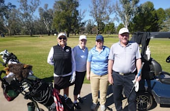 Winners shoot low under sunny skies