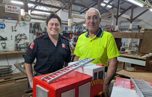 Men's Shed donates two toy firetrucks to Station 270.