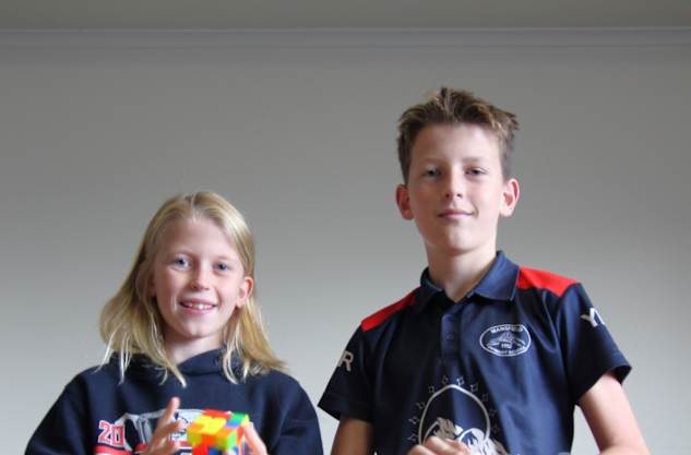 State championships for speedcubing siblings