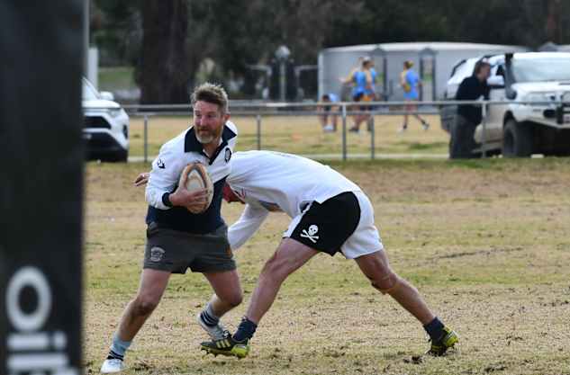 Pythons Old Boys lace up the boots for anniversary