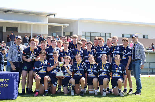 Rugby juniors don Waratah jumpers