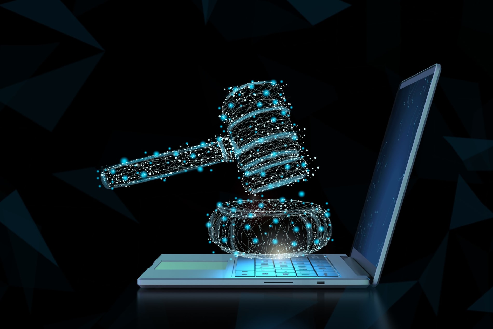 Digital rendering of a hammer and gavel hovering above a laptop keyboard