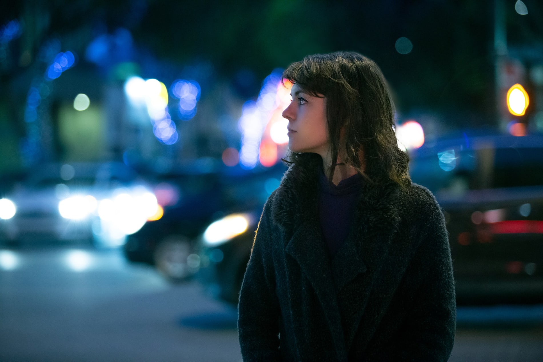 Woman Walking At Night in the City 