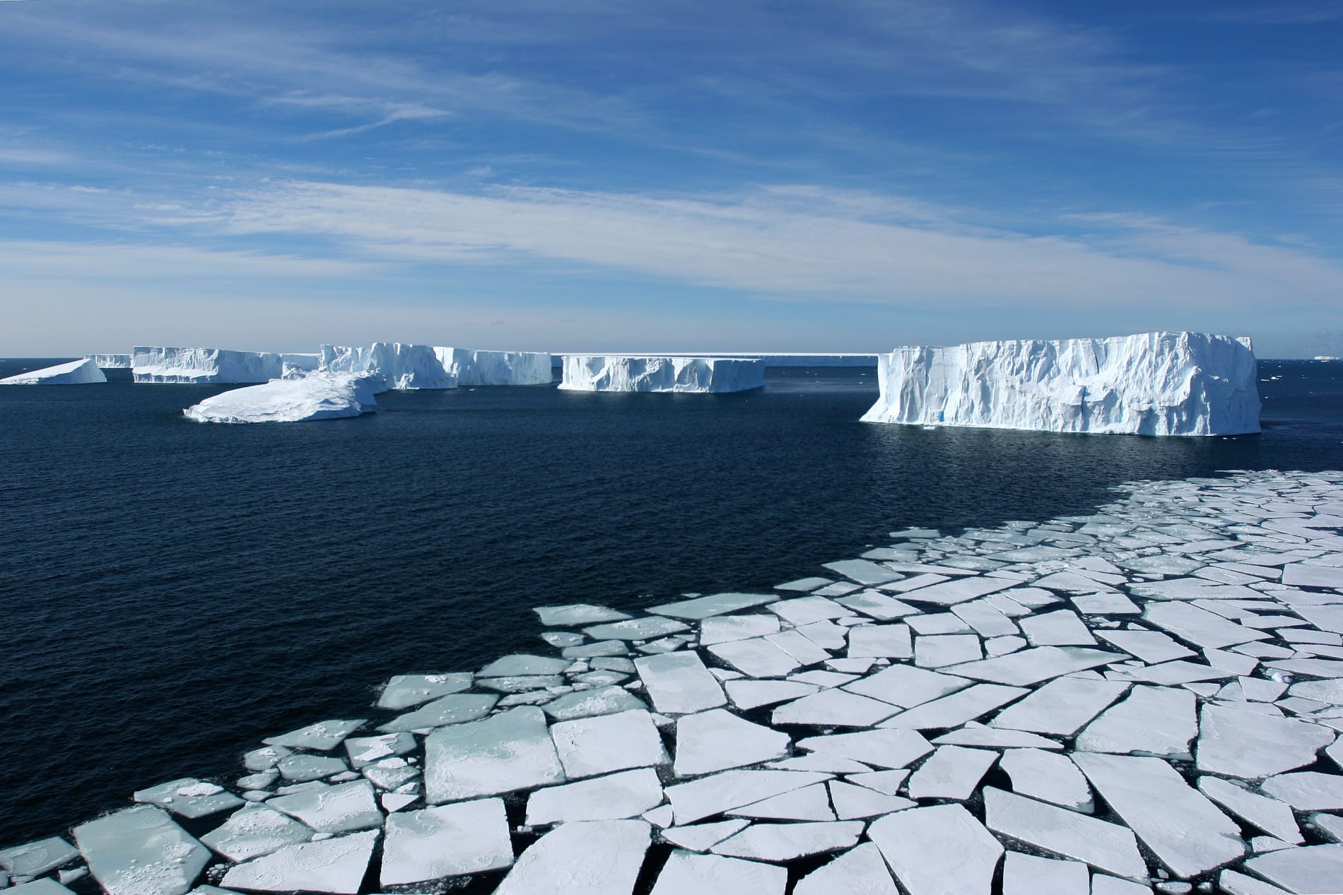 Aerial View with Pack Ice and Icebergs