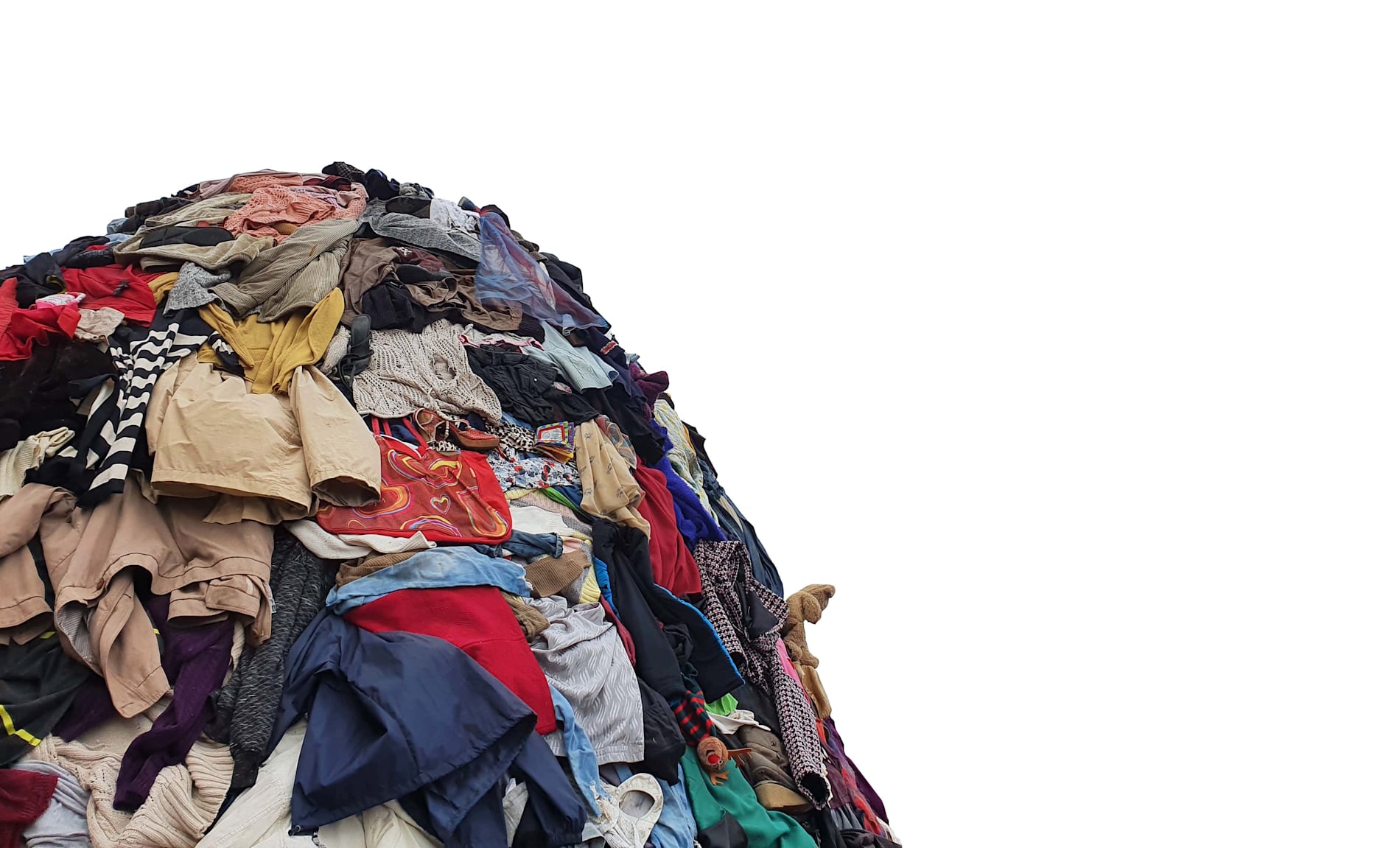 A large pile of clothes, with a white background