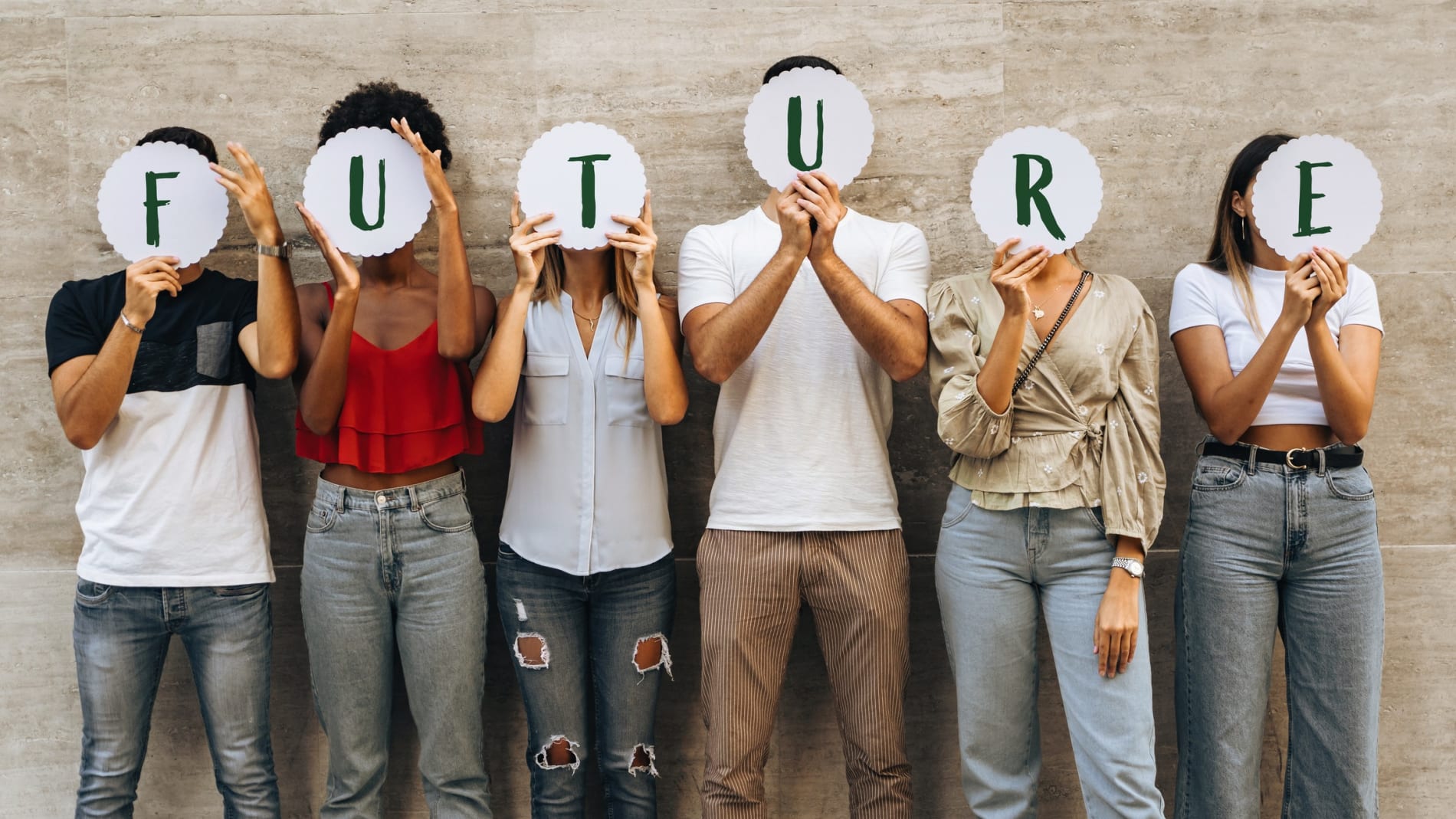 Group of young people hiding their face with the word Future