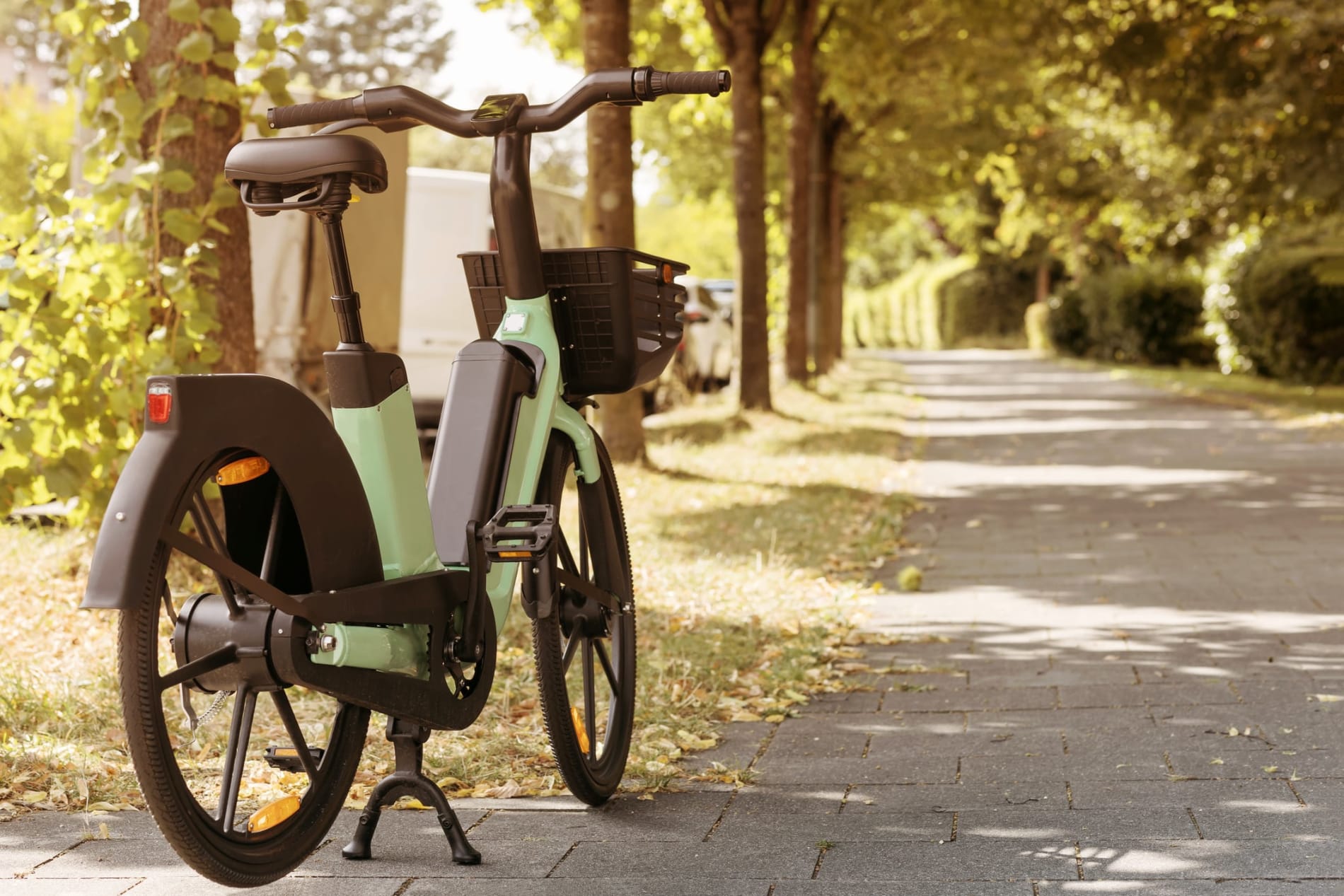 An e-bike parked on a suburban path