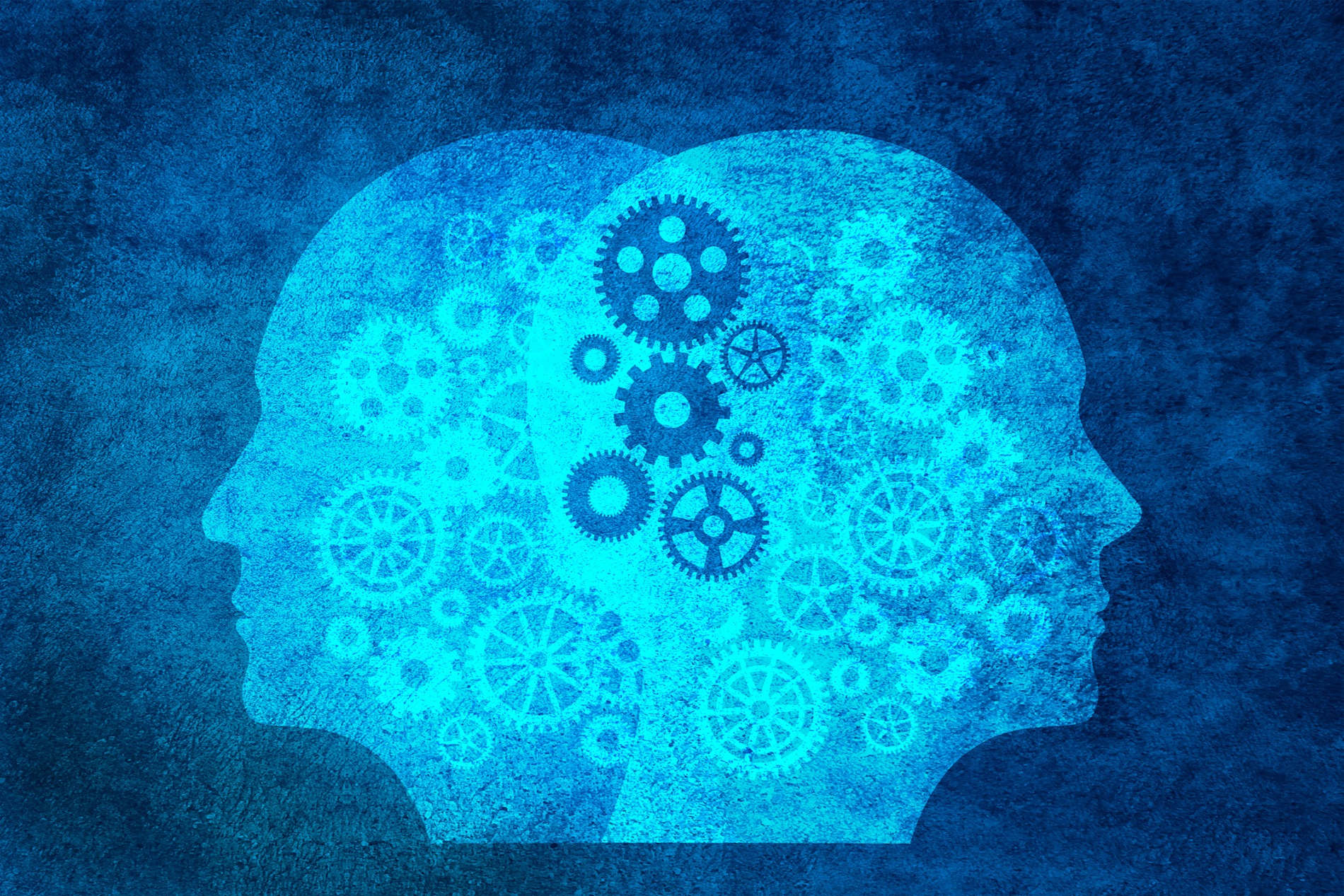 Human head silhouette with machine gears