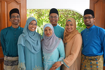 Dr Mohamed Hassan Ariff and Dr Rohana Jamil (centre) with their four children.