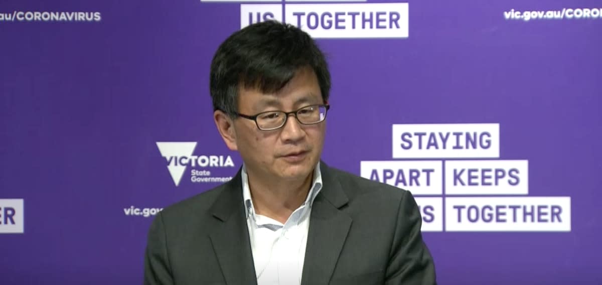 Professor Allen Cheng speaking at a Victorian government press conference 
