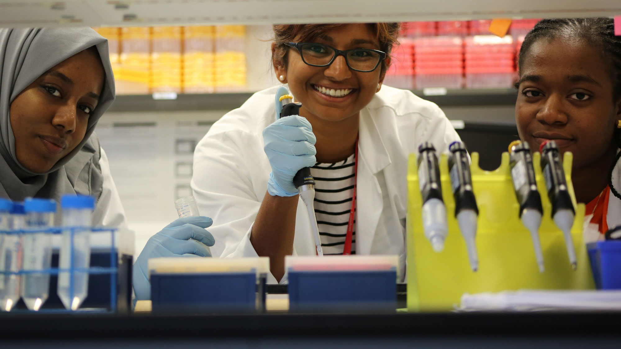 Dr Ana Baburamani in the lab with students