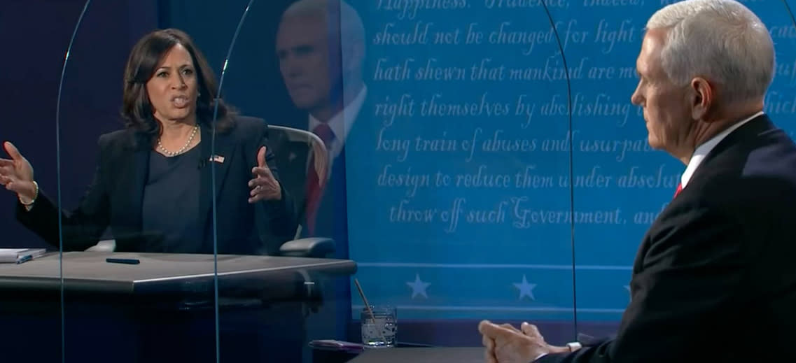 Senator Kamala Harris and Vice-President Mike Pence in the vice-presidential debate, divided by COVID protective screens