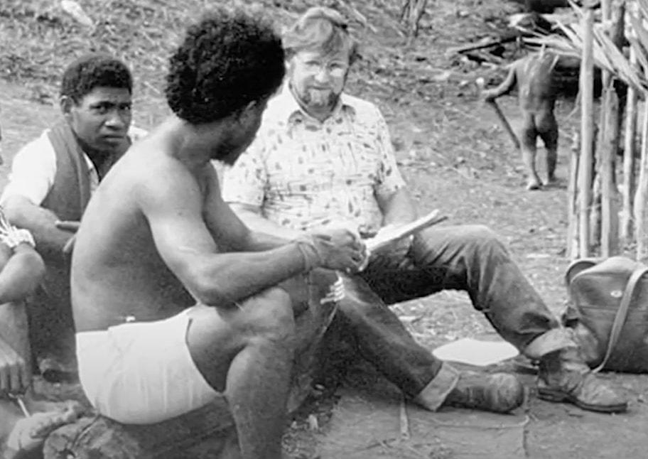 Dr Tim Ealey interviewing villagers along New Guinea's Hiritano