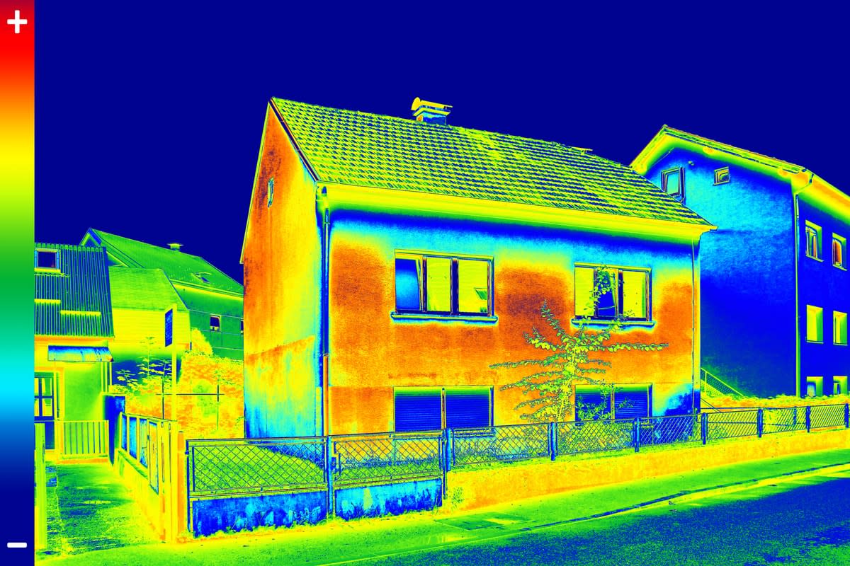 A thermal image of a double-storey house, showing warm and cool areas