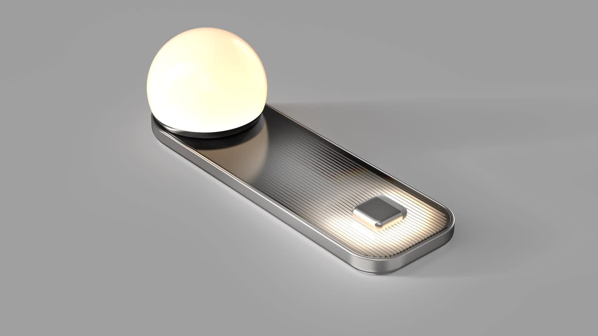 The prototype bedside lamp with a healthy warm light that’s also a wireless phone charger and a wireless sensor charger.