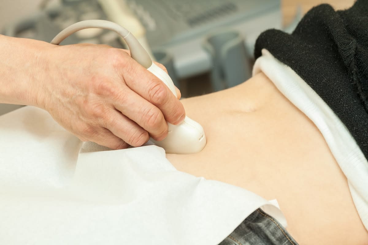 Close-up of a women having an ultrasound on her belly