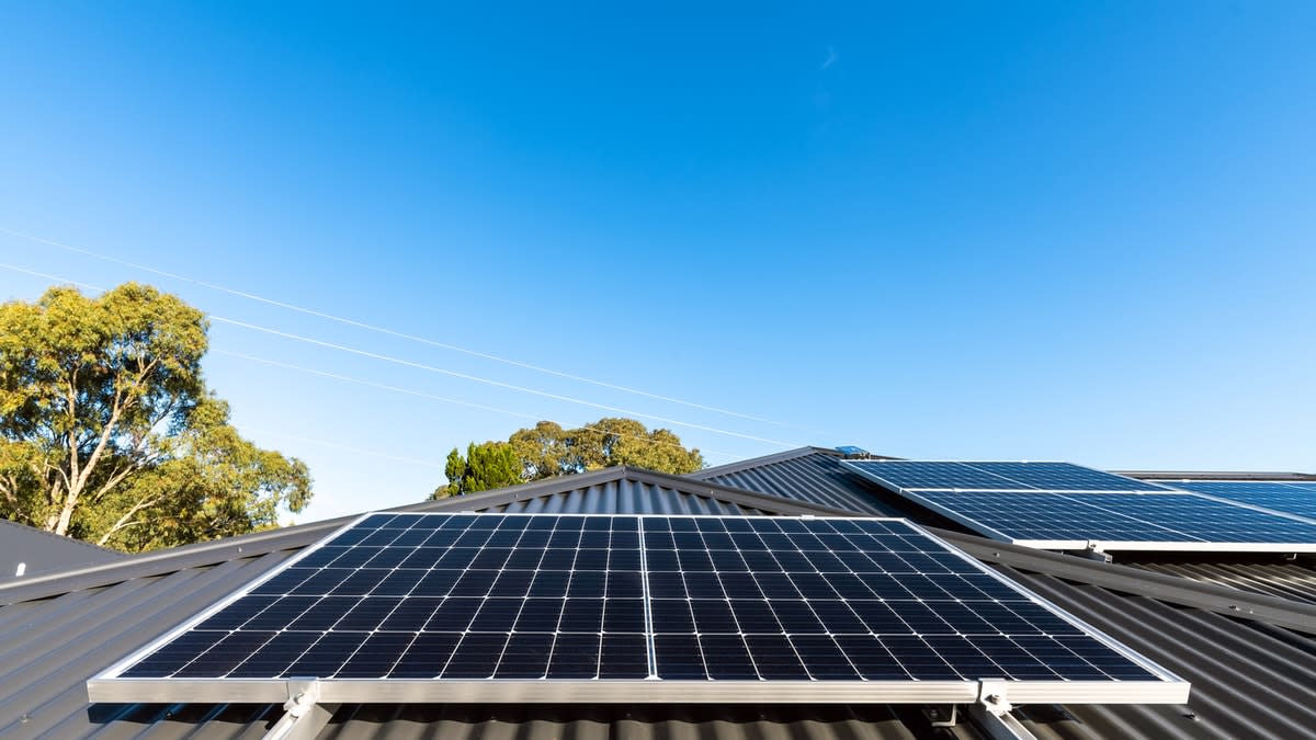 Solar panels on a house rooftop