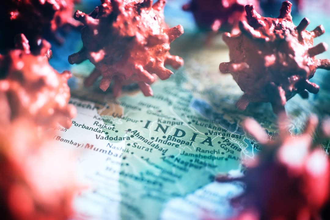 Map of India and coronavirus concept.