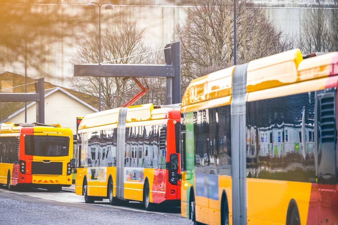 Electric public bus recharging at power station in Copenhagen, Denmark.