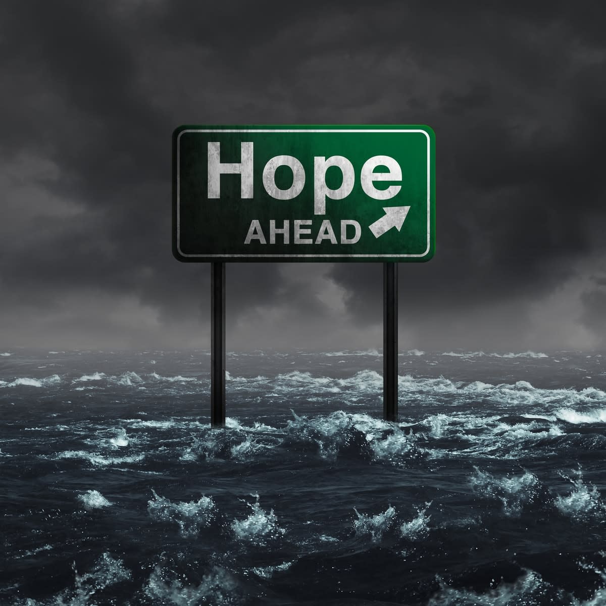 A sign in a raging sea reading ‘Hope ahead‘ with an arrow pointing to the right