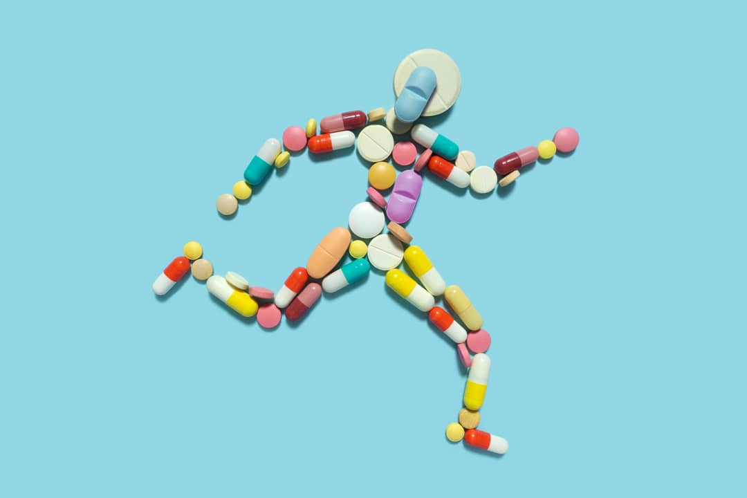 Creative medicine health sport concept photo of man person made of pills drugs running for doping.