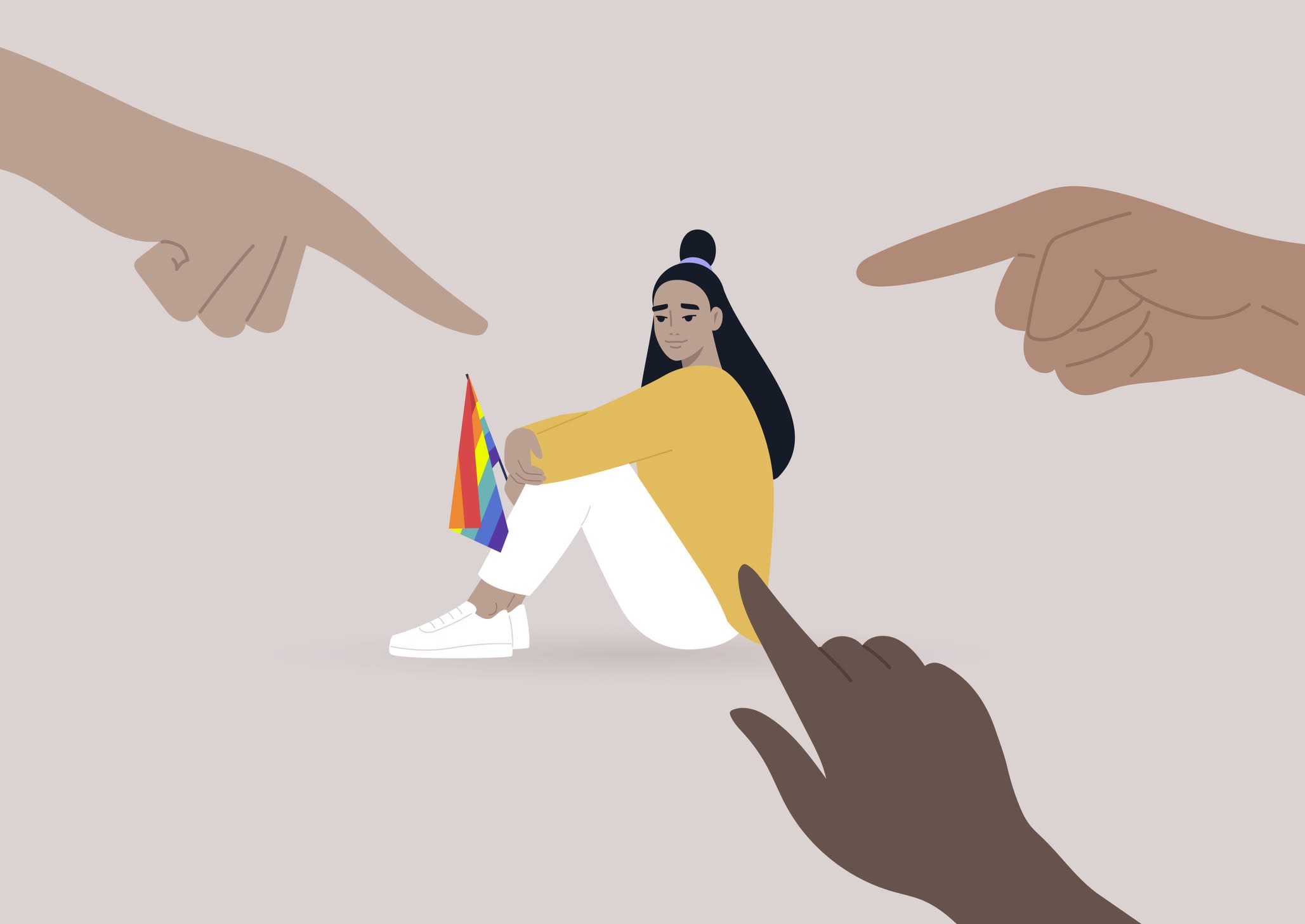 Fingers pointing at an lgbtq person