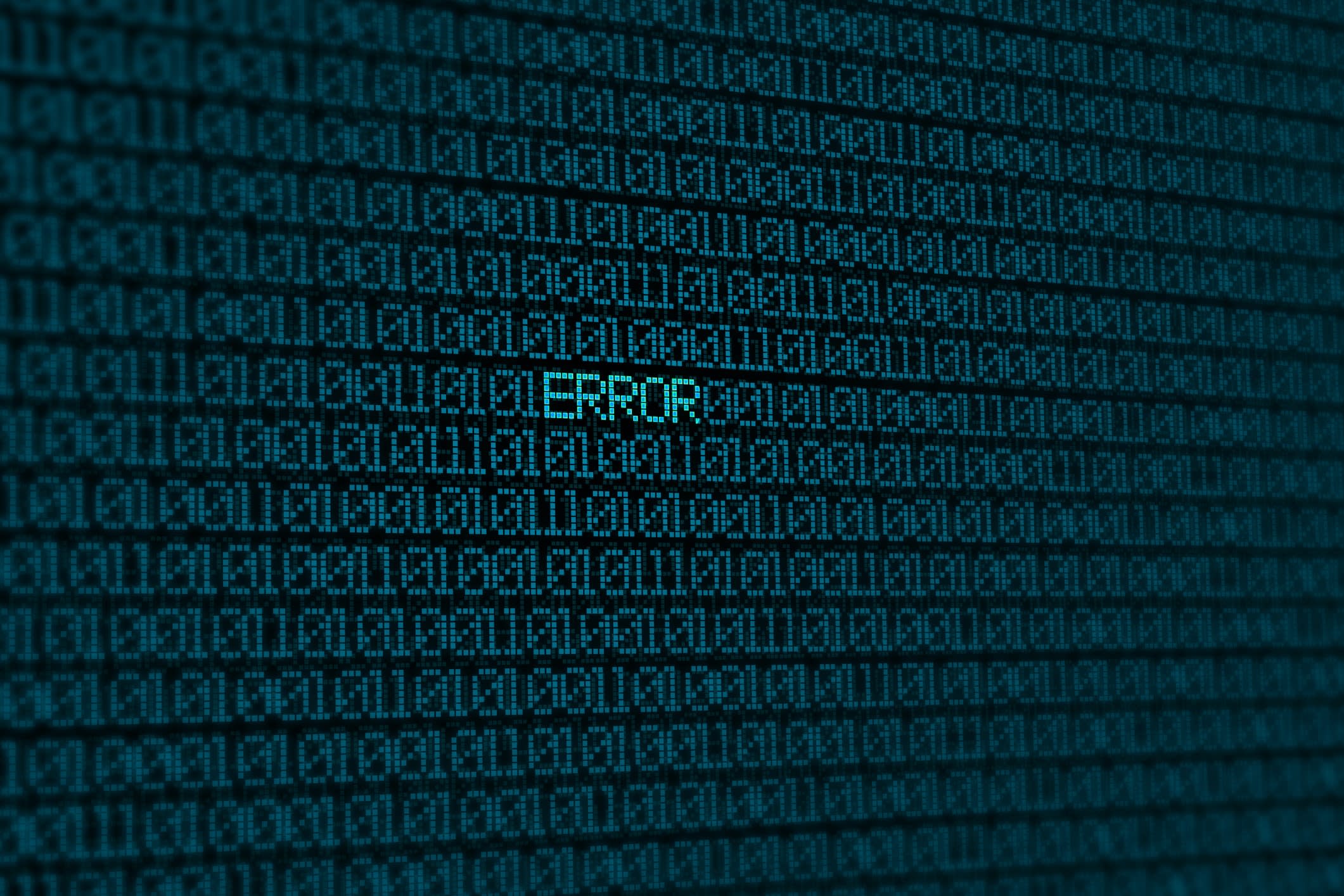 Glowing blue binary code on screen with word 'error' in the centre