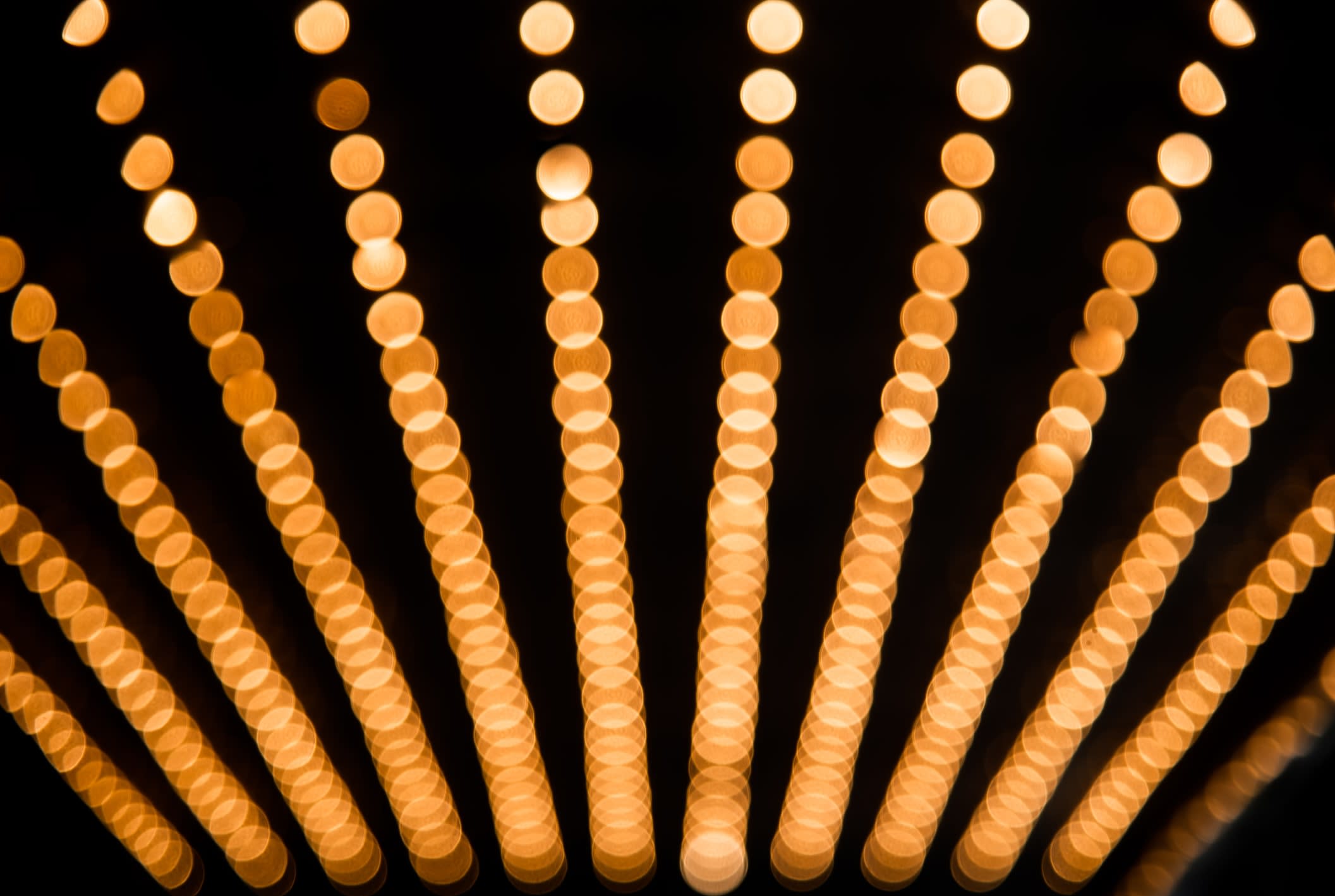 A close-up row of marquee lights from Crown casino