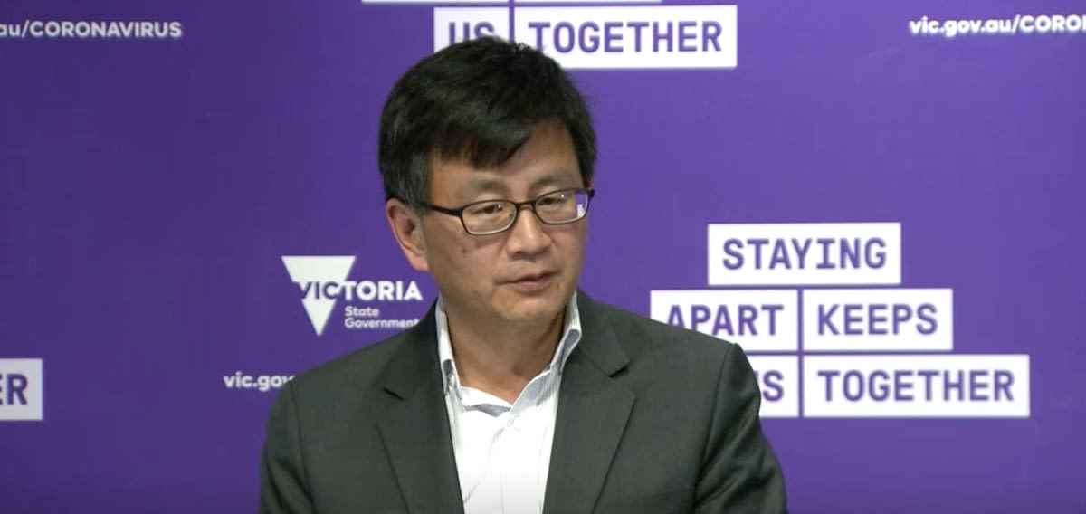 Professor Allen Cheng speaking at a Victorian government press conference