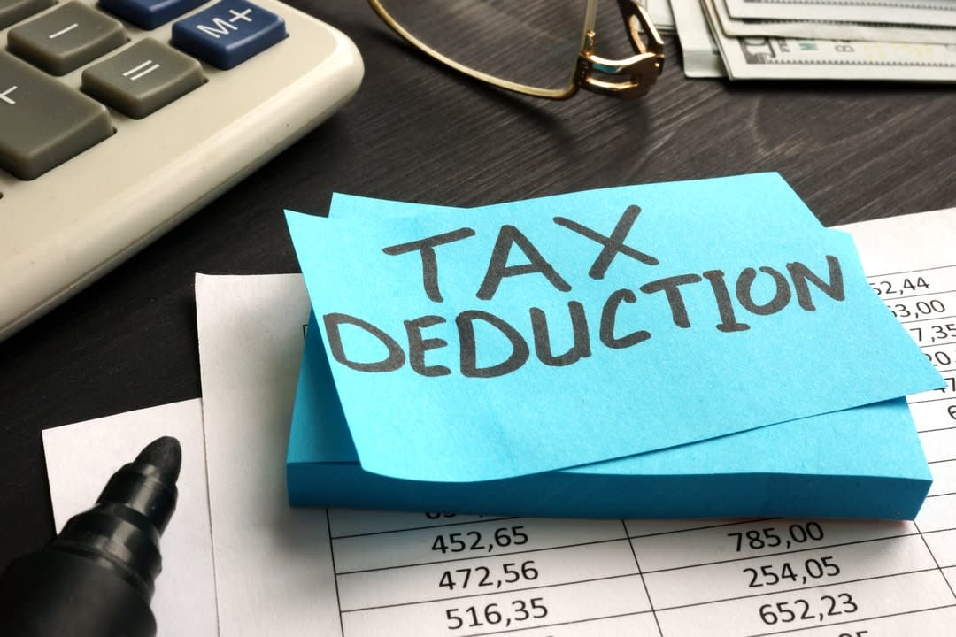 Tax deduction written on a piece of paper