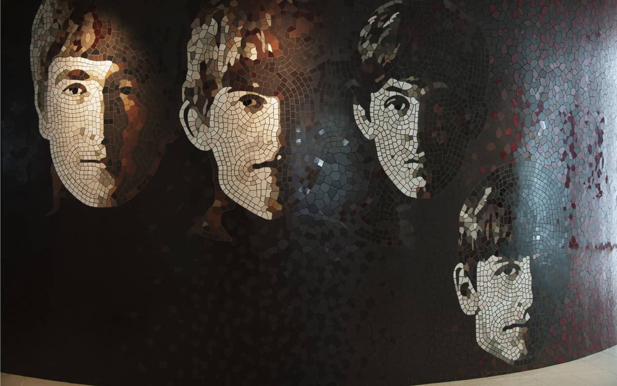 A mosaic rendering of the Beatles' faces from their 'With the Beatles' album 