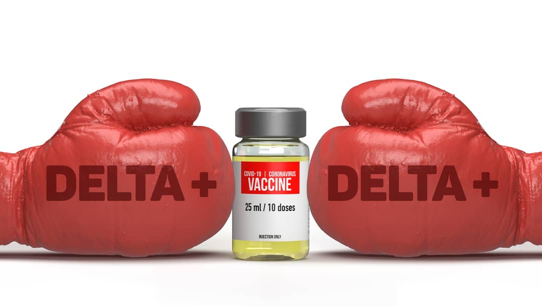 Delta plus virus infected boxing gloves are hitting a coronavirus vaccine filled glass bottle