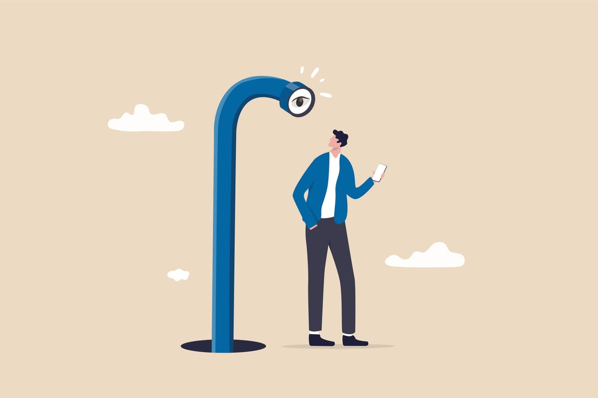 Illustration of a man holding a mobile phone, being watched by a giant periscope with an eye