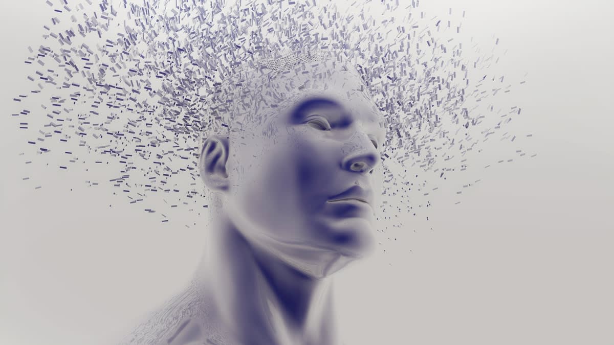 Stylised image of a man's head, the top shatering into flying pieces