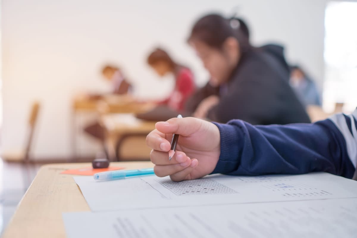 Students sitting an exam in a classroom