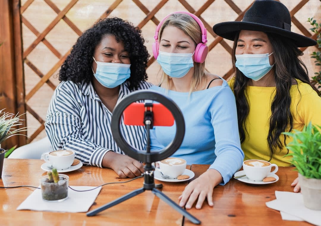 Diverse group of women broadcasting information.