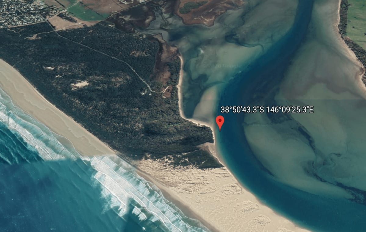 An aerial photo with coordinates showing the Sandy Point location where the skeletal remains were found.