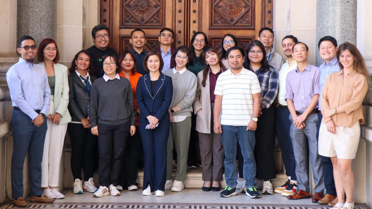 Trang Nguyen and the fellows from across Southeast Asia, part of the Australia Award Fellowship Program’s Southeast Asia Just Energy Transition, outside the Victorian Parliament.