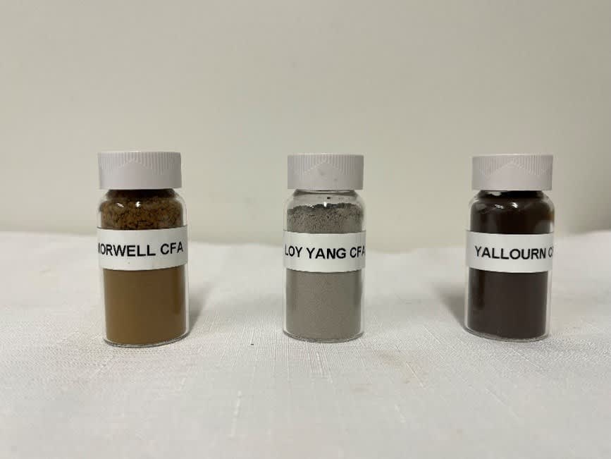 Small glass bottles with labels, each filled with ash  