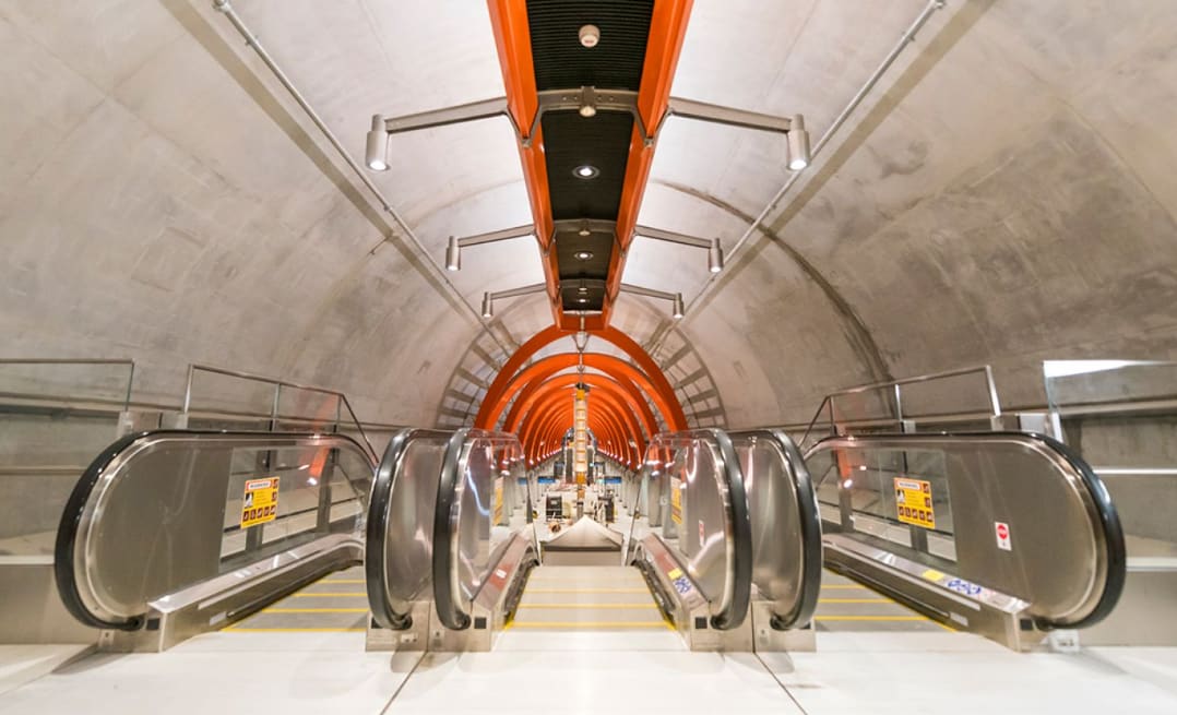 Escalators heading down to the platform at the Metro Tunnel’s Town Hall Station. 