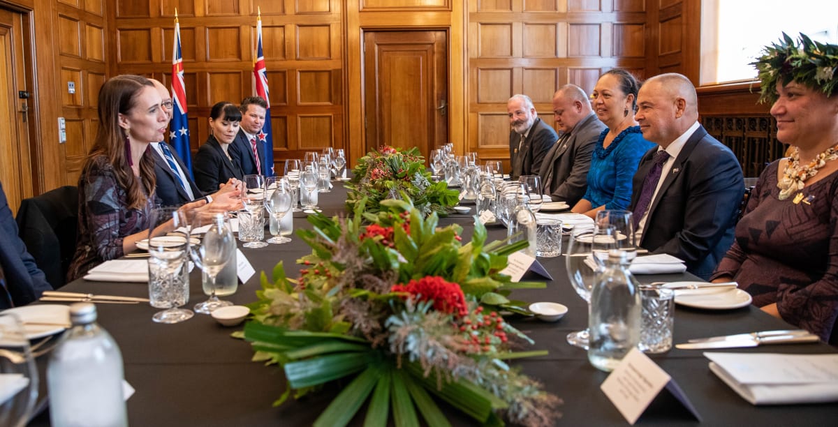 Prime Minister Jacinda Ardern and Mark Brown sit down to discuss the supply of Covid-19 vaccines and reopening borders between New Zealand and Cook Islands. Photo: Ryan Anderson / Pool