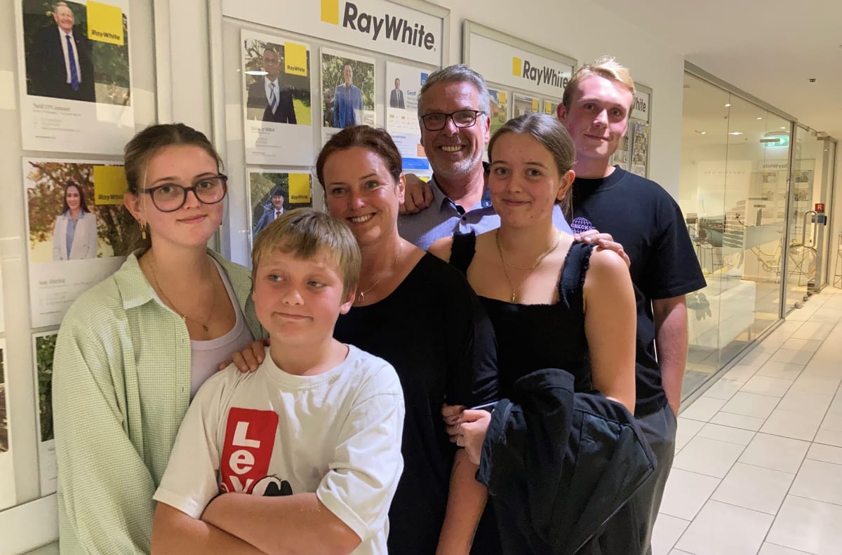 Excited after selling her restored villa, Fiona Grove, centre, with her partner Leighton Bycroft and their family, from left, Zoe, Jamie, Ella and Jordan.