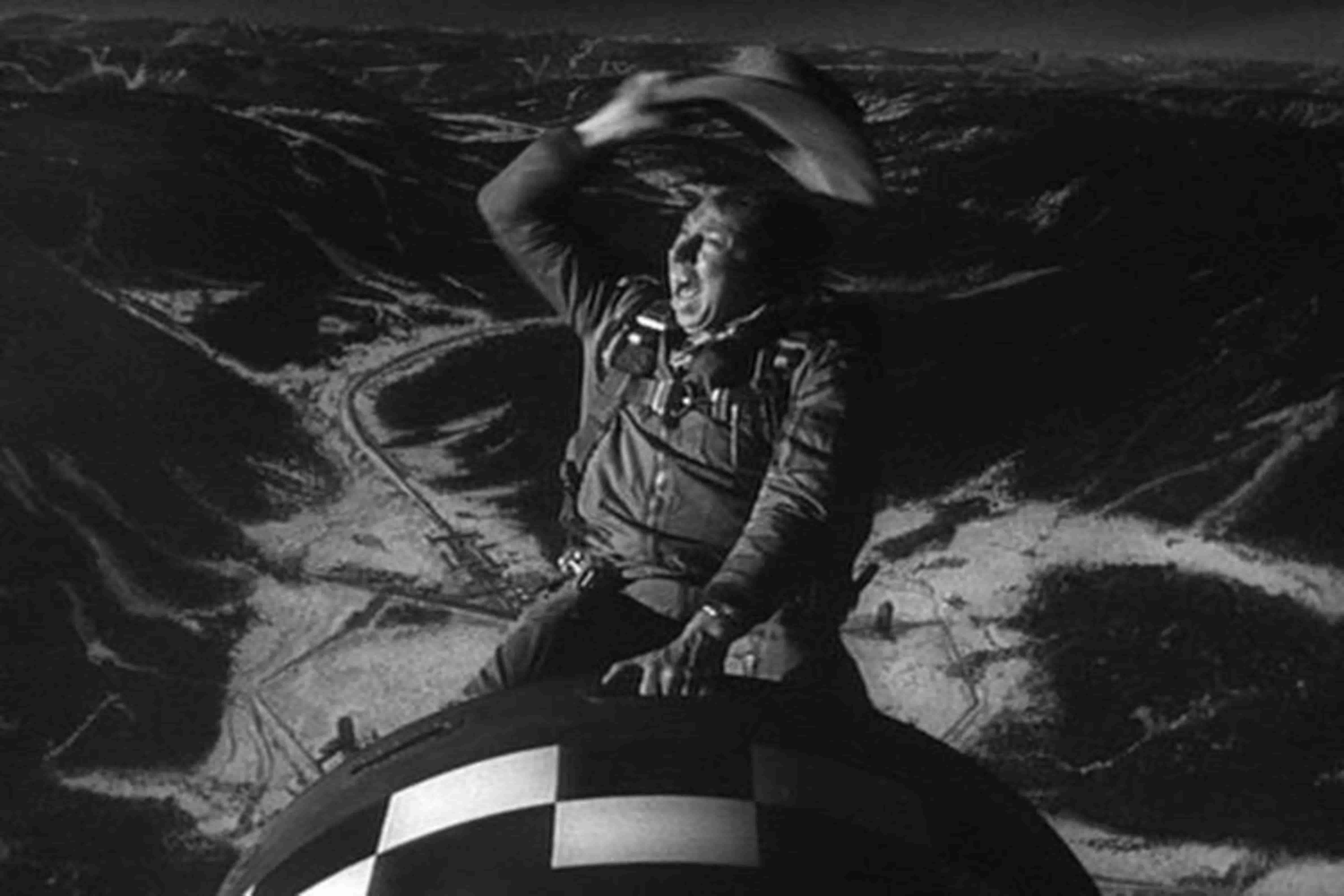 Slim Pickens in Dr. Strangelove riding the atom bomb out of the plane like a rodeo cowboy
