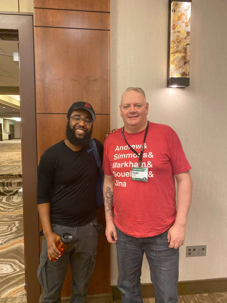 Farai Madzima and Todd Libby at An Event Apart Denver posing for a photo.