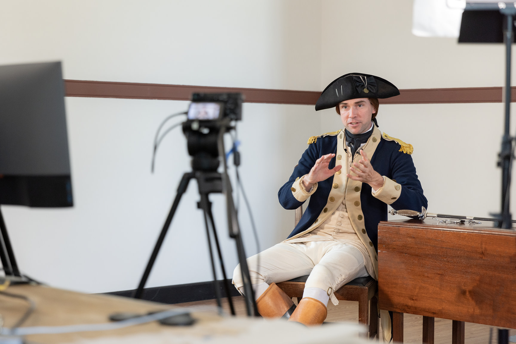 George Washington discusses a topic with teachers online