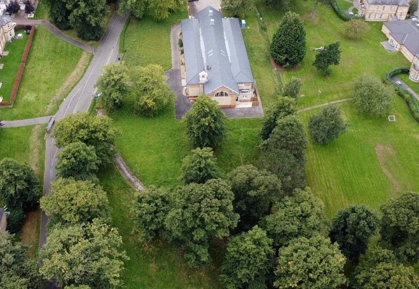 a building surrounded by trees